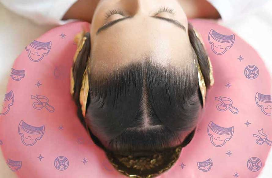 Cojín para dormir con moños de fallera