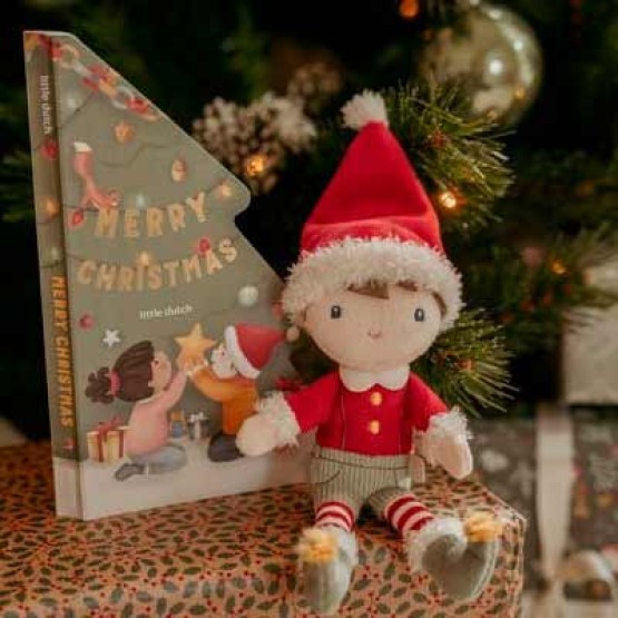 libro y muñeco navidad